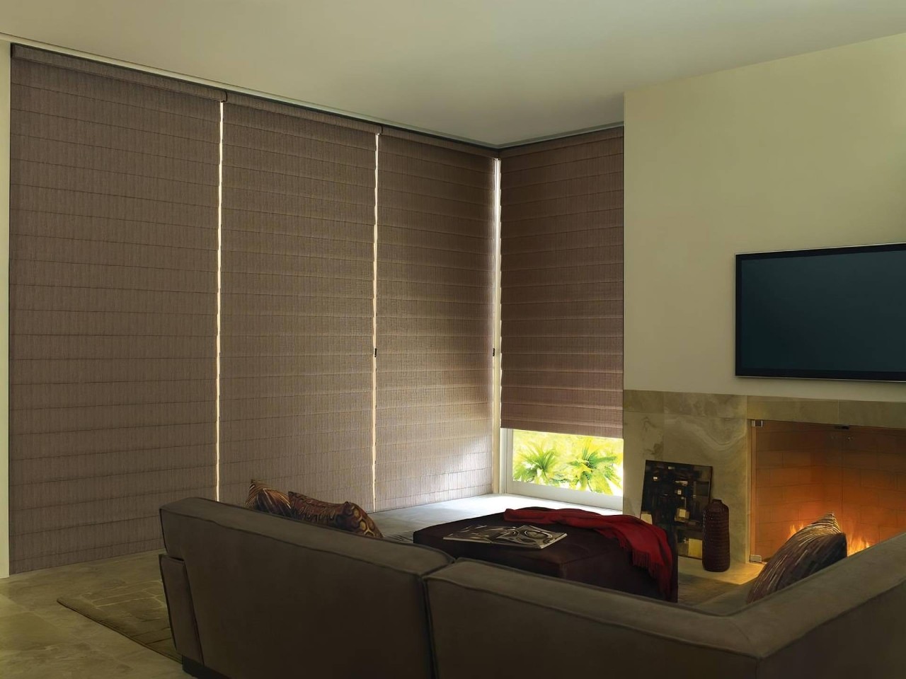 Hunter Douglas Alustra® Woven Textures® Roman Shades decorating a home’s windows near Hayden, ID