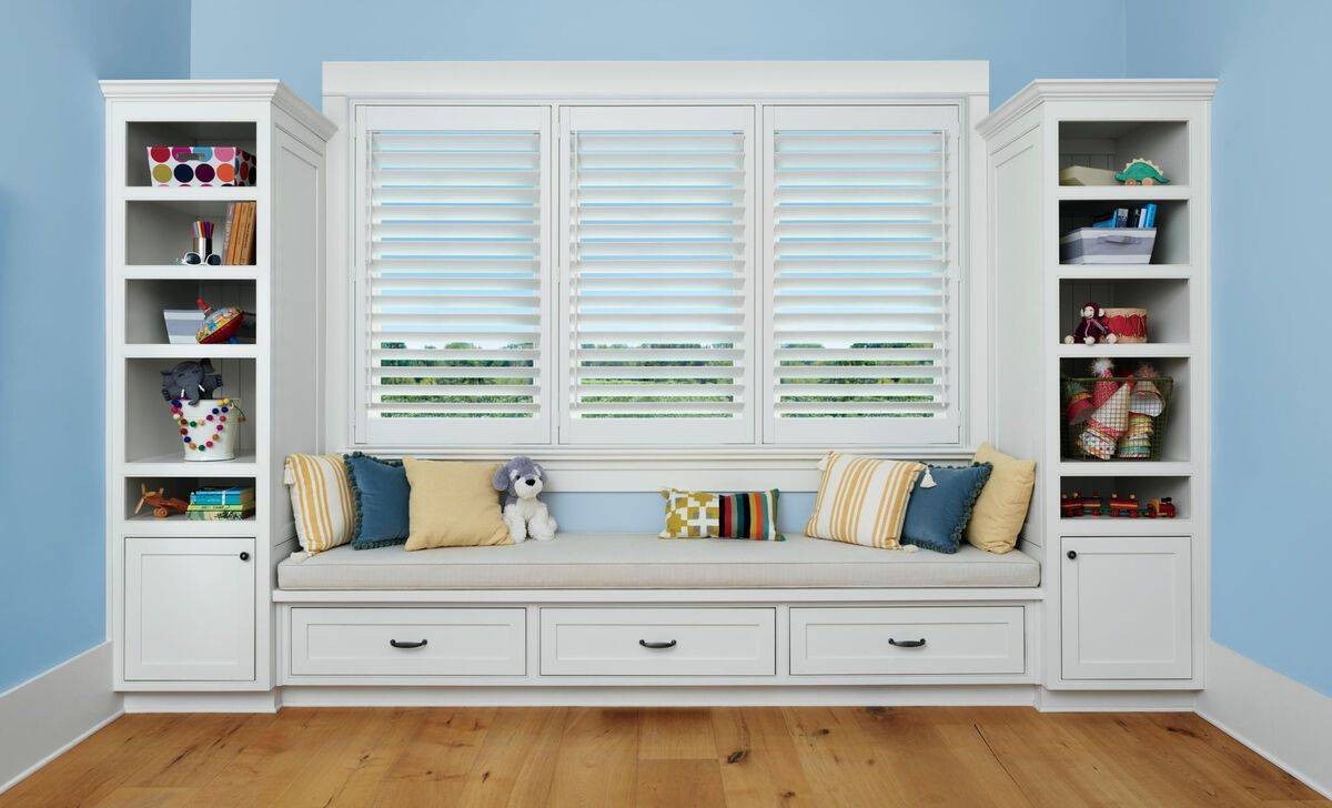  Immaculate Hunter Douglas Palm Beach™ Polysatin™ Vinyl Shutters decorating the window in a child’s room near Hayden, ID