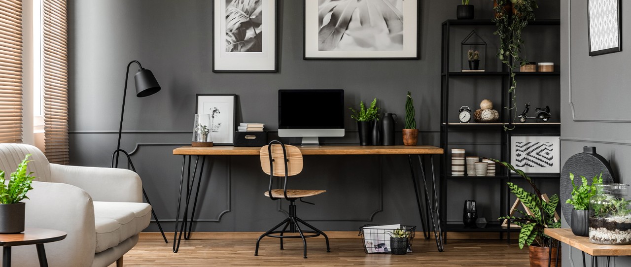 Large office with a modern style work station and lamp lighting.